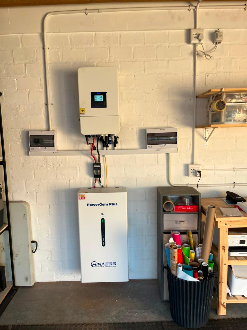 A lithium battery bank installed on a wall by Sun Savings